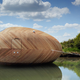 Illustration for article titled Uh, Why Is an Artist Living Inside a Floating Wooden Egg For a Year?